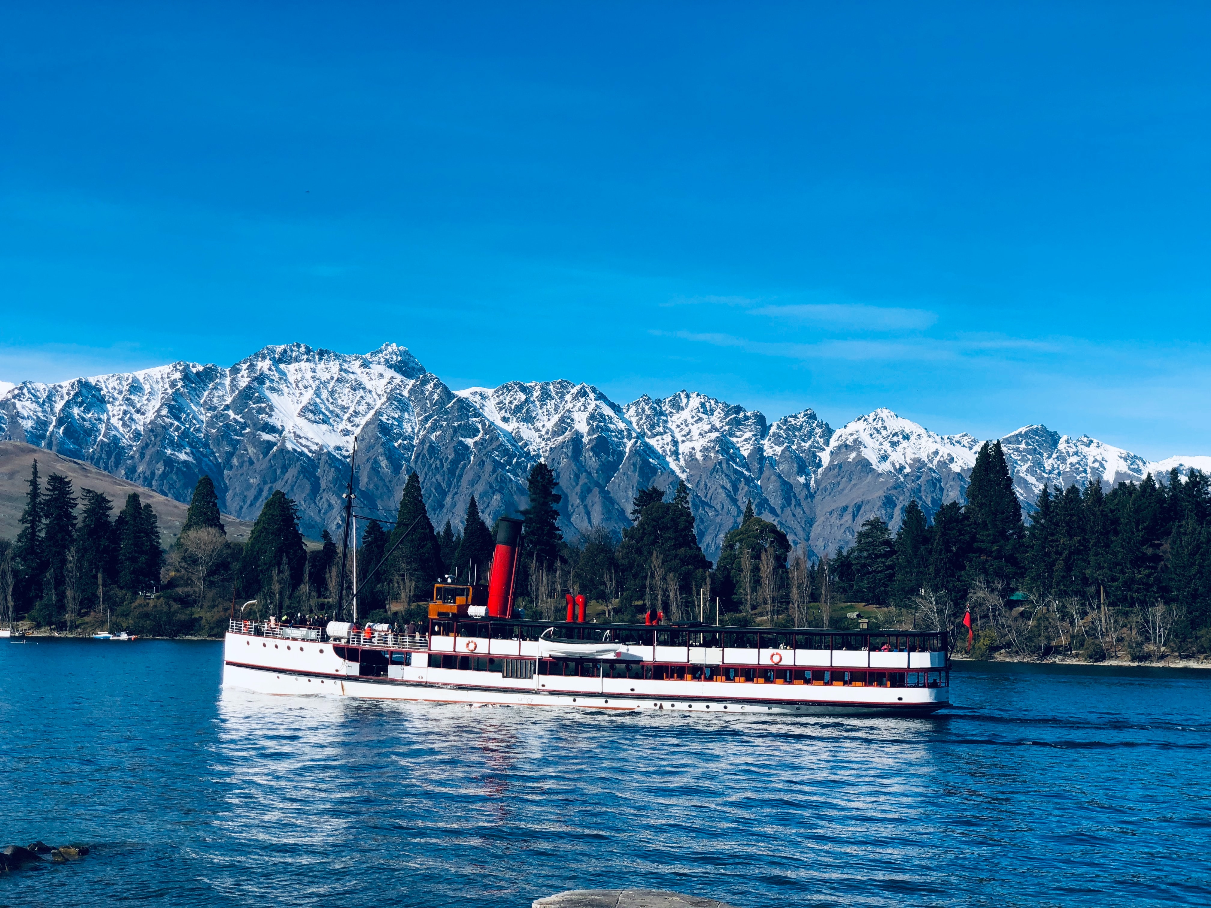 The historic steamer TSS Earnslaw on Lake Wakatipu with the Remarkables in the background - image Courtesy Kirsten Frosh And Unsplash