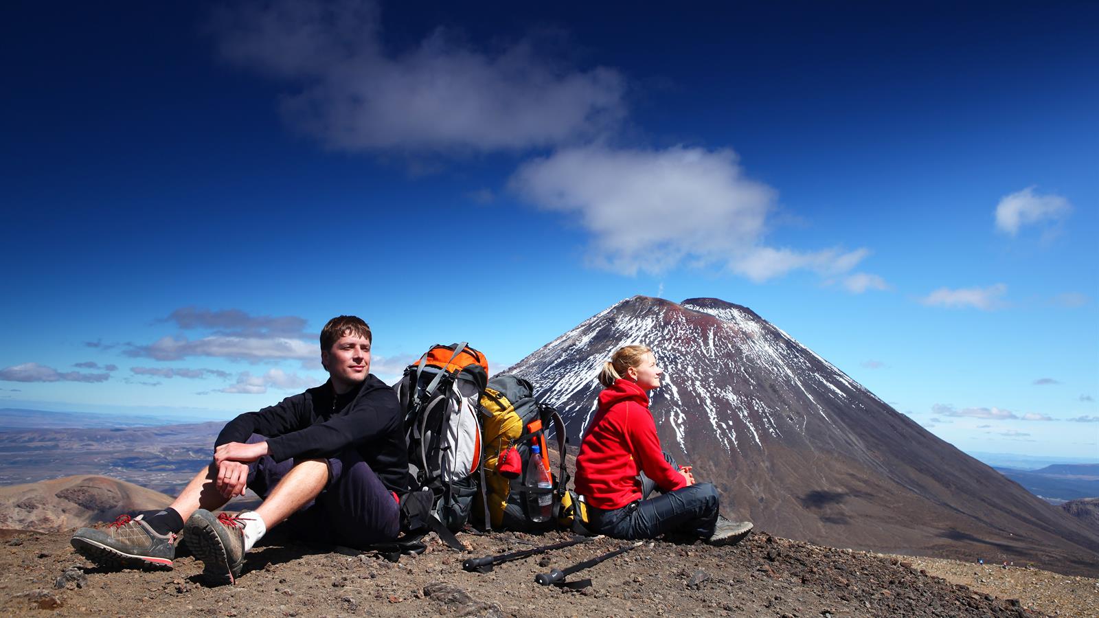 Taking time to admire the view on the Tongariro Alpine Crossing. Pic courtesy tongarirocrossing.org.nz