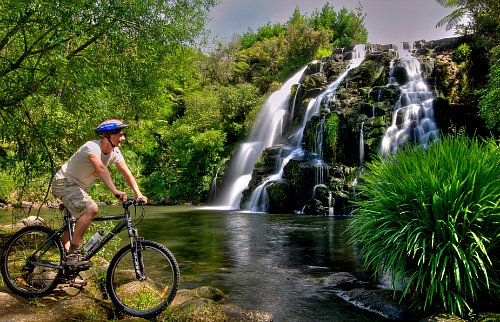 Biking at Owharoa Falls, in the Karangahake Gorge, Coromandel New Zealand, picture courtesy Tourism Coromandel