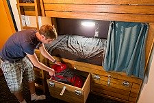 Comfortable dorm beds at Haka Lodge Queenstown feature lockable storage