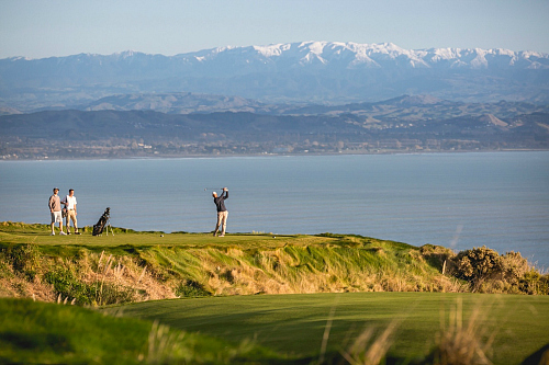 Teeing off at magnificent Cape Kidnappers - pic courtesy Miles Holden