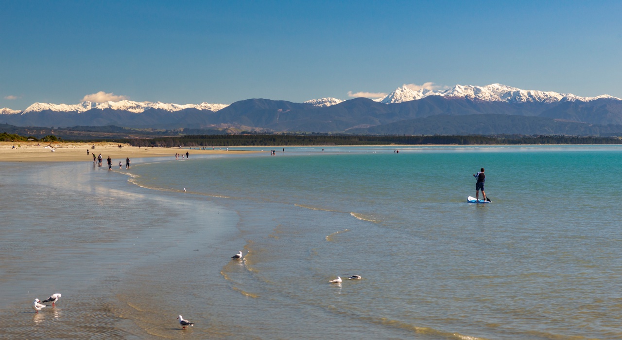 Winter paddle boarding at Tahuna beach Nelson. Picture courtesy nelsontasman.nz